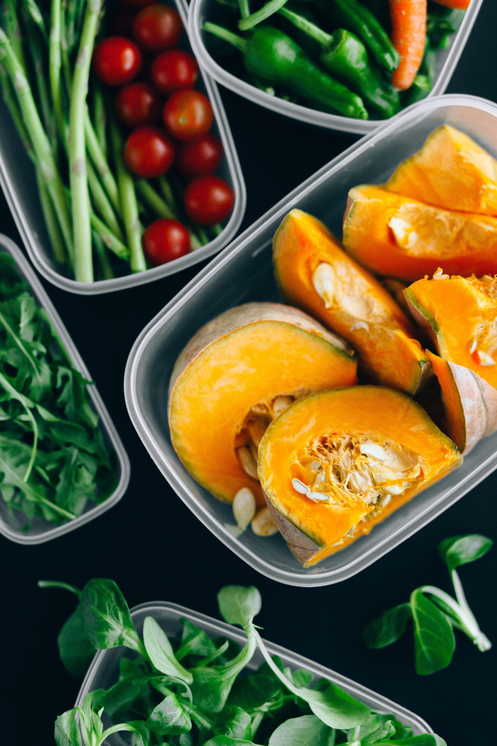 Fresh vegetables prepared and stored in transparent containers to make meal prep easier