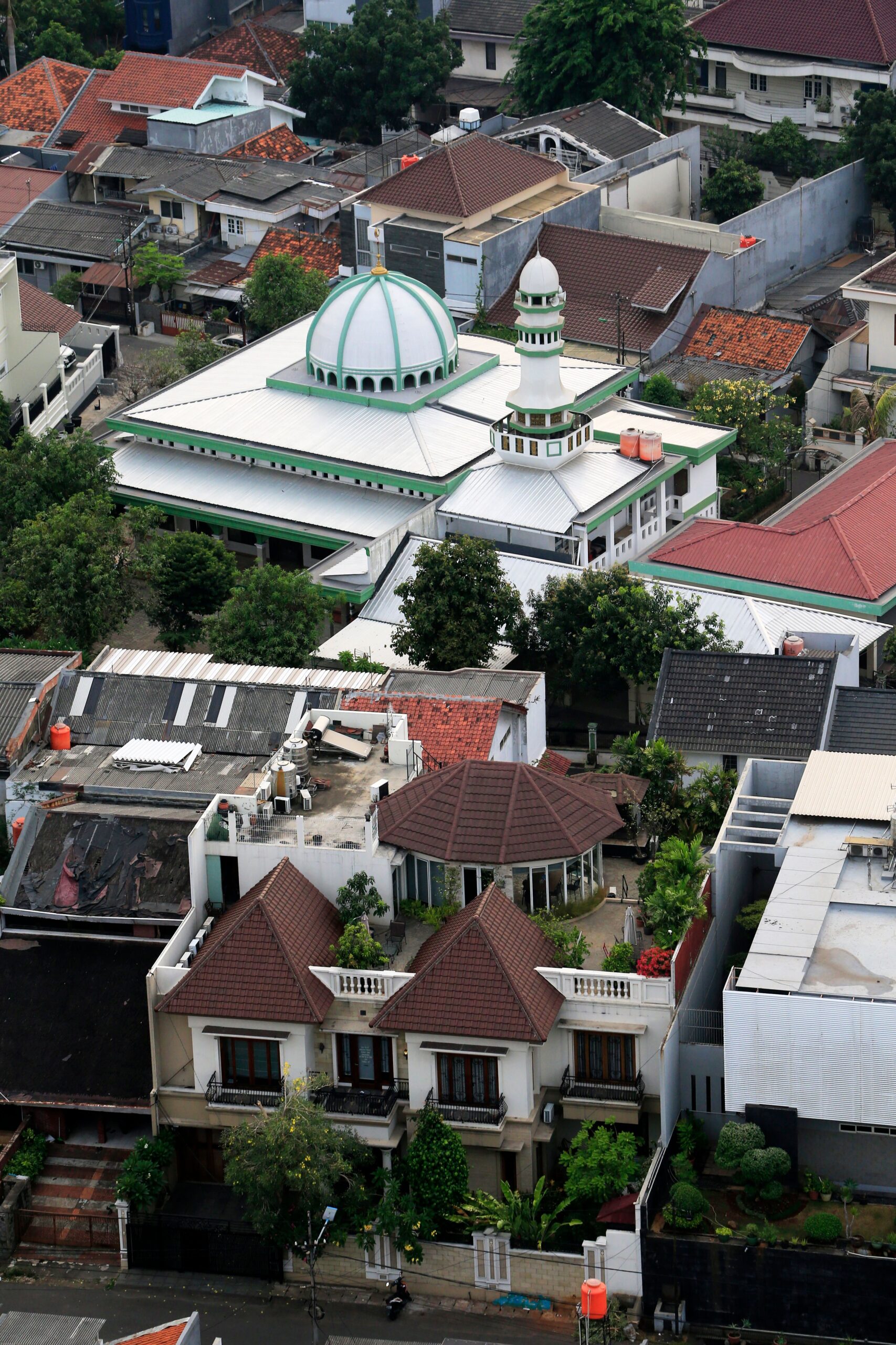 Aerial view of a mosque in Indonesia surrounded by residential neighborhoods